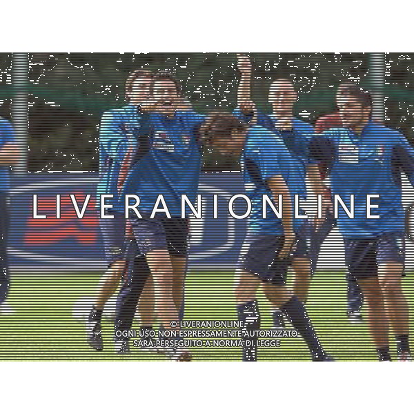 Raduno e Allenamento Nazionale Italiana Coverciano(FI) - 09.10.2007 Nella Foto: Fabio Grosso scherza con gli altri giocatori con Massimo Oddo Ph.Vitez-Ag. Aldo Liverani