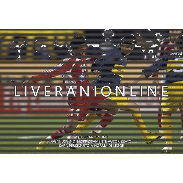 FIFA Club World Cup Japan 2007 Tokyo - 12.12.2007 Boca Juniors(ARG)vsEtoile Sportive du Sahel(TUN) Nella Foto:Mohamed Ali Nafkha-Ever Banega /Ph.Vitez-Ag. Aldo Liverani