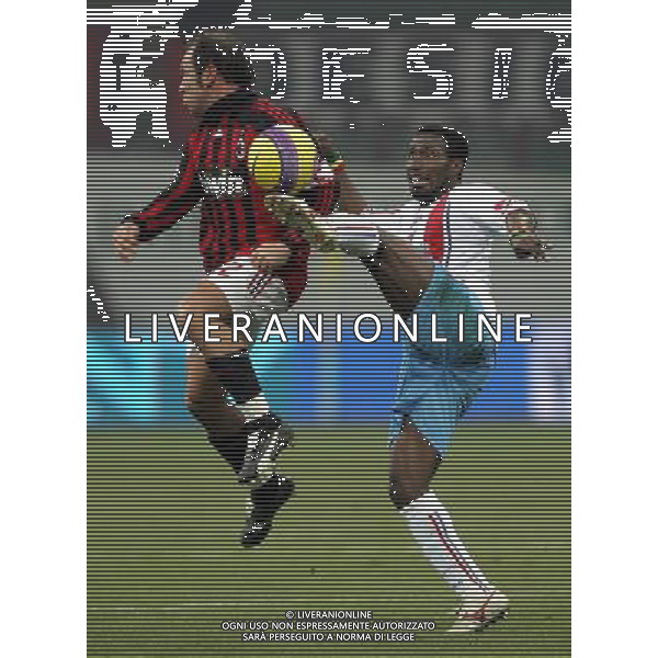 Milano 20/12/2007 coppa italia tim 2007/08 milan-catania 1:2 nella foto cristian brocchi e mark edusei ph marco luzzani/ag aldo liverani s.a.s.