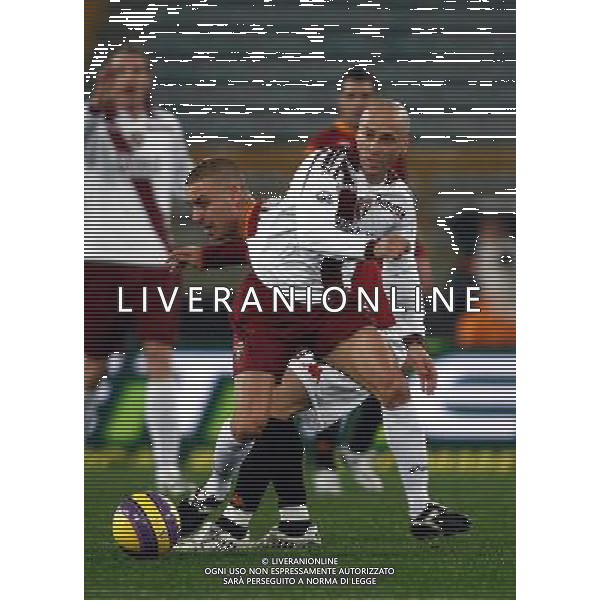 Roma - Torino (4-0) - 16/01/2008 Coppa Italia TIM CUP 2007/2008 Ottavi di finale ritorno nella foto: Eugenio CORINI e Daniele DE ROSSI ph Corradetti / ag. Aldo Liverani Sas