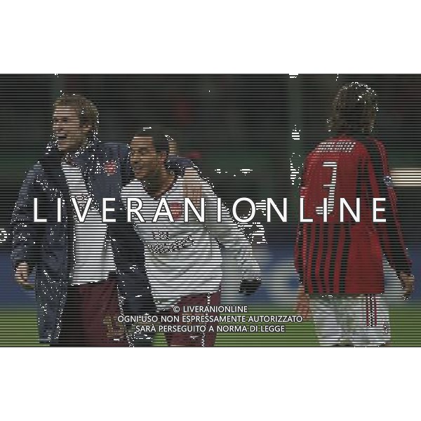 Milan - Arsenal Ottavi di finale di ritorno Champions League 04/03/2008 nella foto esultanza hleb e walcott e la delusione di paolo maldini ph luzzani/Ag. Aldo Liverani sas