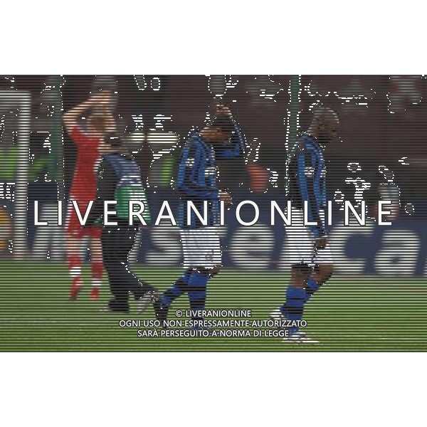 Champions League 2007/2008 Ottavi di Finale Ritorno Milano - 11.03.2008 Inter-Liverpool Nella Foto: la delusione di Rivas e Pele\' che escono dal campo a testa bassa /Ph.Vitez-Ag. Aldo Liverani