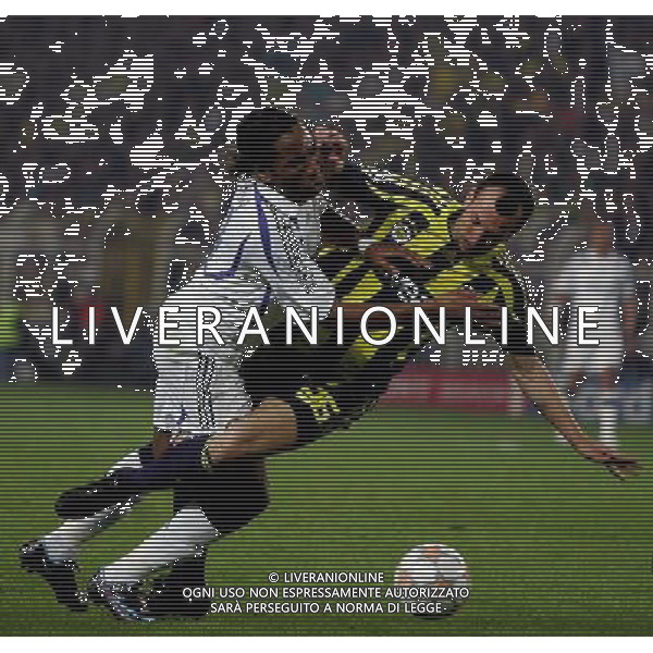 action with Didier Drogba of Chelsea and Edu Dracena of Fenerbahce Fenerbahce v Chelsea -CHAMPIONS LEAGUE QUARTER-FINAL FIRST LEG at the Sukru Saracoglu stadium in Istanbul (Turkey) on 02/04/2008 Picture By Marcello Pozzetti©IPS - Photo Agency/Ag. Aldo Liverani sas - ONLY ITALY - EDITORIAL USE ONLY - 