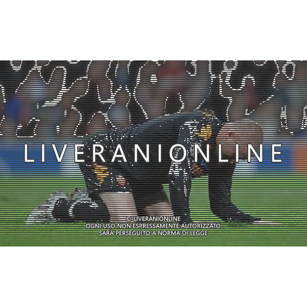 Manchester United-Roma Champions League 2007/2008 Quarti di Finale Ritorno Manchester - 09.04.2008 Nella Foto: DANIELE DE ROSSI A TERRA DELUSO /Ph.Vitez-Ag. Aldo Liverani