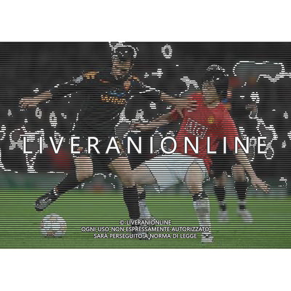 Champions League 2007/2008 Quarti di Finale Ritorno Manchester - 09.04.2008 Manchester United-Roma Nella Foto:VUCINIC MIRKO-PARK JI-SUNG /Ph.Vitez-Ag. Aldo Liverani