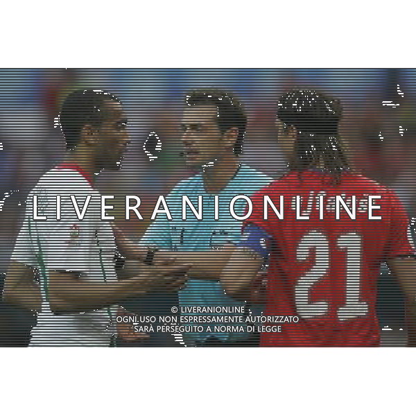 Ginevra 11-06-2008 Campionati europei calcio EURO2008 repubblica ceca-portogallo 1:3 nella foto arbitro kyros vassaras con bosingwa e tomas ujfalusi ph marco luzzani/ag aldo liverani s.a.s.