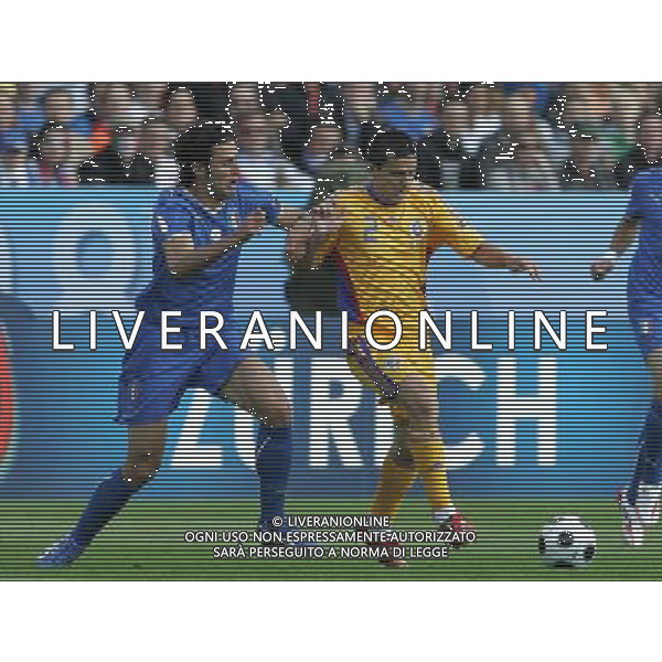 Italia-Romania UEFA EURO 2008 Gruppo C M13 Zurigo - 13.06.2008 Nella Foto: fabio grosso e contra Ph.Luzzani/Ag. Aldo Liverani