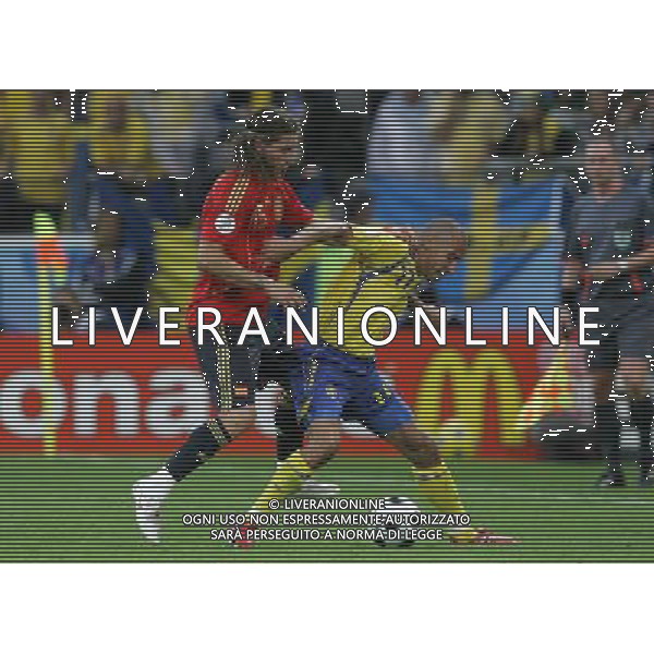 Svezia - Spagna 14/06/2008 Europei Innsbruck nella foto larsson e sergio ramos ph luzzani/Ag. Aldo Liverani Sas