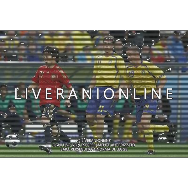 Innsbruck (AUT) 14-06-2008 Campionato europeoo calcio EURO2008 svezia-spagna 1:2 nella foto david villa, daniel andersson ph marco luzzani/ag aldo liverani s.p.a.