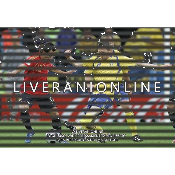 Innsbruck (AUT) 14-06-2008 Campionato europeoo calcio EURO2008 svezia-spagna 1:2 nella foto mikael nilsson e santi cazorla ph marco luzzani/ag aldo liverani s.p.a.