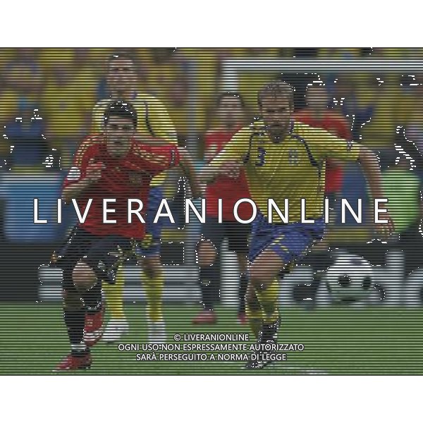 Innsbruck (AUT) 14-06-2008 Campionato europeoo calcio EURO2008 svezia-spagna 1:2 nella foto david villa e olof mellberg ph marco luzzani/ag aldo liverani s.p.a.