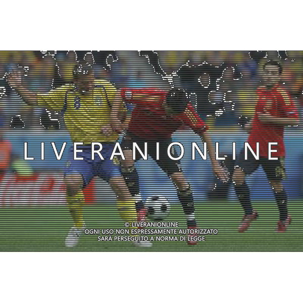 Innsbruck (AUT) 14-06-2008 Campionato europeoo calcio EURO2008 svezia-spagna 1:2 nella foto anders svensson e david villa ph marco luzzani/ag aldo liverani s.p.a.