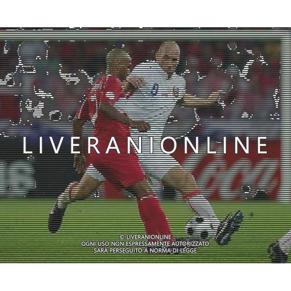 Turchia - Repubblica Ceca 3:2 15.06.2008 Europei 2008 Ginevra nella foto Mehmet Aurelio e Jan Koller copyright by firo sportphoto/Ag. Aldo Liverani sas - ITALY ONLY -