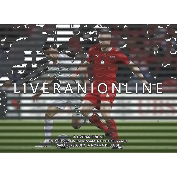 Basilea (CH) 15-06-2008 Campionato europeo calcio EURO2008 svizzera-portogallo 2:0 nella foto philippe senderos e helder postiga ph marco luzzani/ag aldo liverani s.a.s.