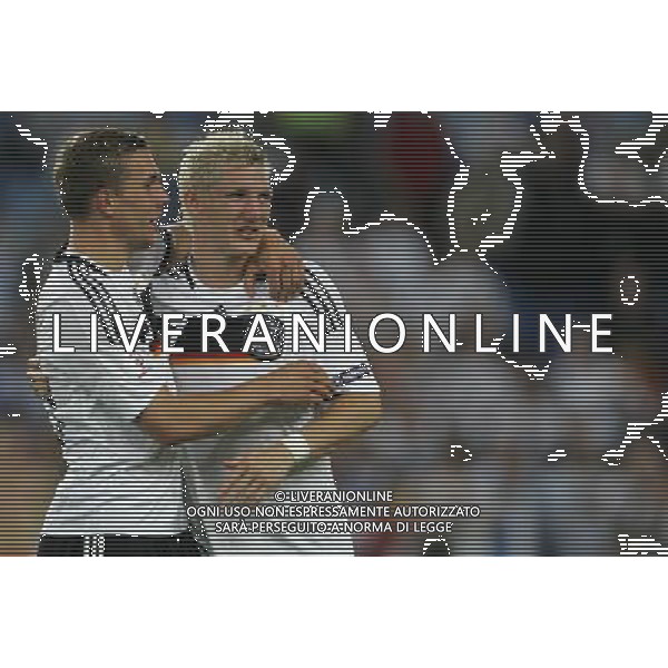 Basilea 19-06-2008 Campionato europeo calcio EURO2008 Portogallo-Germania 2:3 nella foto lukas podolski e bastian schweinsteiger ph marco luzzani/ag aldo liverani s.a.s. 