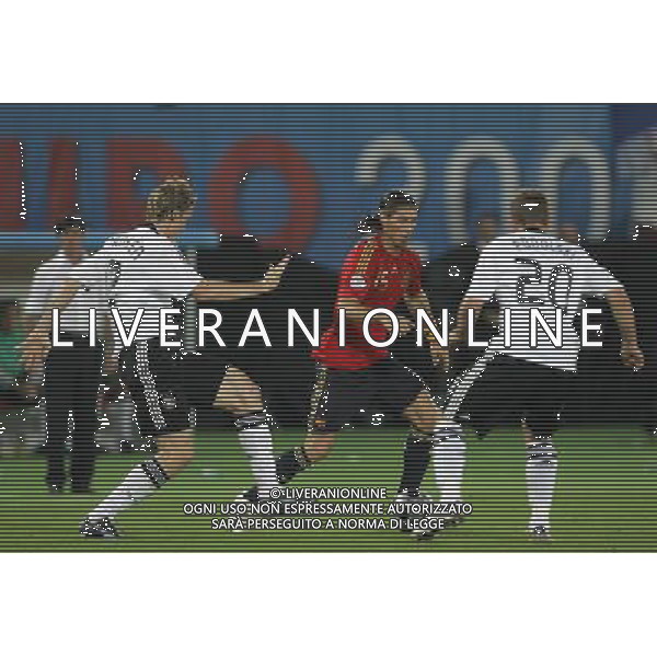 Vienna (AUT) 29-06-2008 Campionato europeo calcio EURO2008 FINALE germania-spagna 0:1 nella foto sergio ramos, lukas podolski e marcell jansen ph marco luzzani/ag aldo liverani s.a.s.