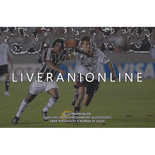INTERNATIONAL FOOTBALL LIBERTADORES CUP 2008 / FINAL MATCH RETURN FLUMINENESE_LDU QUITO 3-1 (Dpp 1-3) ( Maracana Stadium Rio ) AROUCA ( Flum )_ URRUTIA PATRICIO JAVIER (Ldu) =============================================== ATT : IMAGES ONLY FOR THE ITALIAN MARKET AG ALDO LIVERANI