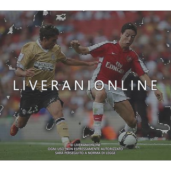 Juventus\' Fausto Rossi and Arsenal\'s Samir Nasri in the pre-season Emirates Cup (Juventus-Arsenal-Real Madrid and Hamburg) at the Emirates Stadium in London(UK) on 02/08/2008 .Picture By Marcello Pozzetti ©IPS - Photo Agency :21 Delisle Road London SE28 0JD mobile: 07973 308 835 Ag Aldo Liverani