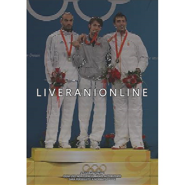 Pechino -08-2008 Giochi Olimpici Pechino Beijing 2008 finale spada maschile individuale nella foto il podio olimpico da sx jeannet fabrice (FRA), matteo tagliariol (ITA), abajo jose luis (spa) ph marco luzzani/ag aldo liverani s.a.s.