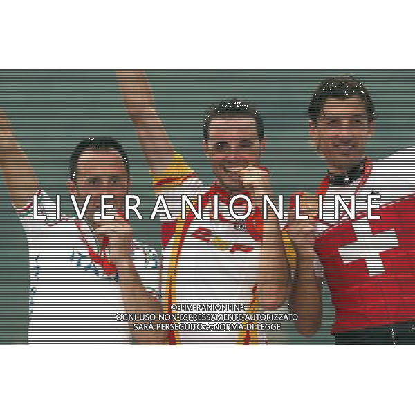 PECHINO 9/8/2008 OLIMPIADI 2008 CICLISMO SU STRADA UOMINI NELLA FOTO IL PODIO (SANCHEZ SAMUEL ORO, DAVIDE REBELLIN ARGENTO E FABIAN CANCELLARA BRONZO) FOTO SIROTTI/AG ALDO LIVERANI