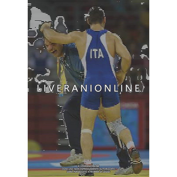Pechino 14-08-2008 Giochi Olimpici Pechino Beijing 2008 lotta greco romana 84 kg nella foto andrea minguzzi (ITA) oro esulta dopo la vittoria con salvatore giunta ph marco luzzani/ag aldo liverani s.a.s.