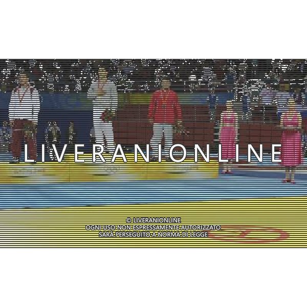 Pechino 14-08-2008 Giochi Olimpici Pechino Beijing 2008 lotta greco romana 84 kg nella foto Andrea Minguzzi (ITA) oro, Zoltan Fodor (HUN) argento e bronzo a nazmi avluca (TUR) bronzo a pari merito con ara abrahamian (SWE) che ha lasciato il podio abbandonando la medaglia al centro della pista di combattimento ph marco luzzani/ag aldo liverani s.a.s.