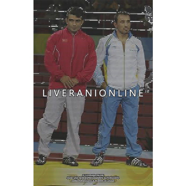 Pechino 14-08-2008 Giochi Olimpici Pechino Beijing 2008 lotta greco romana 84 kg nella foto Andrea Minguzzi (ITA) oro, Zoltan Fodor (HUN) argento e bronzo a nazmi avluca (TUR) bronzo a pari merito con ara abrahamian (SWE) che lascierà polemicamente il podio ph marco luzzani/ag aldo liverani s.a.s.