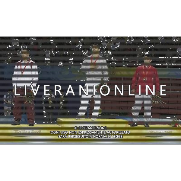 Pechino 14-08-2008 Giochi Olimpici Pechino Beijing 2008 lotta greco romana 84 kg nella foto Andrea Minguzzi (ITA) oro, Zoltan Fodor (HUN) argento e bronzo a nazmi avluca (TUR) bronzo a pari merito con ara abrahamian (SWE) che ha lasciato il podio ph marco luzzani/ag aldo liverani s.a.s.