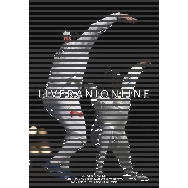 Pechino -08-2008 Giochi Olimpici Pechino Beijing 2008 scherma a squadre nella foto zawrotniak rodoslaw (POL) e robeiri ulrich (FRA) ph marco luzzani/ag aldo liverani s.a.s.