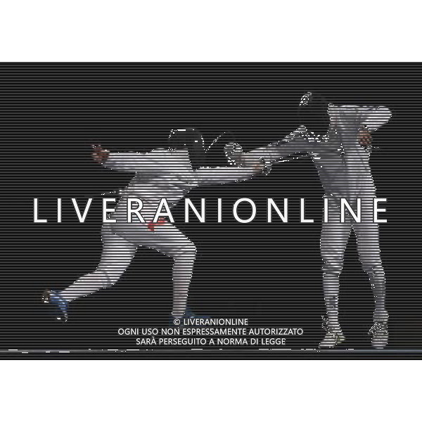 Pechino -08-2008 Giochi Olimpici Pechino Beijing 2008 scherma a squadre nella foto andrezejuk robert (pol) e robeiri Ulrich (FRA) ph marco luzzani/ag aldo liverani s.a.s.