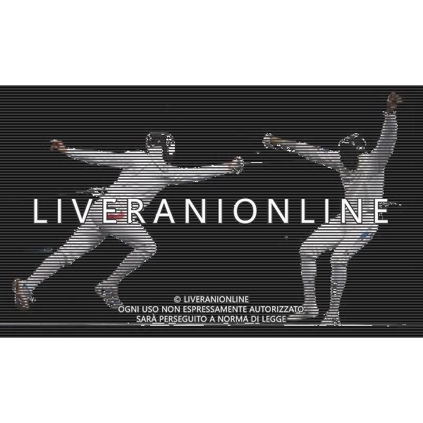 Pechino -08-2008 Giochi Olimpici Pechino Beijing 2008 scherma a squadre nella foto zawrotniak rodoslaw (POL) e jeannet jerome (FRA) ph marco luzzani/ag aldo liverani s.a.s.