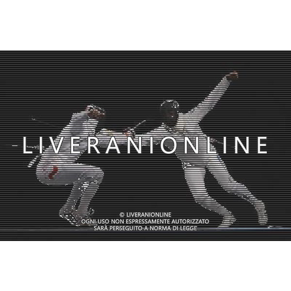 Pechino -08-2008 Giochi Olimpici Pechino Beijing 2008 scherma a squadre nella foto zawrotniak rodoslaw (POL) e jeannet jerome (FRA) ph marco luzzani/ag aldo liverani s.a.s.