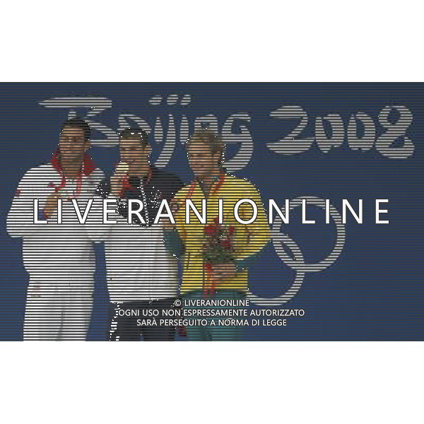 Pechino -08-2008 Giochi Olimpici Pechino Beijing 2008 finali nuoto nella foto michael phelps (usa) oro 100 m farfalla 7° oro, cavic milorad (SRB) argento e lauterstein andrew (AUS) bronzo ph marco luzzani/ag aldo liverani s.a.s.