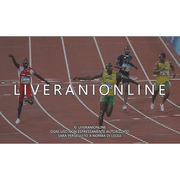 Pechino 16-08-2008 Giochi Olimpici Pechino Beijing 2008 finale 100 m uomini nella foto bolt usain (JAM) oro e record del mondo, thompson richard (TRI) argento e dix walter (USA) bronzo ph marco luzzani/ag aldo liverani s.a.s.