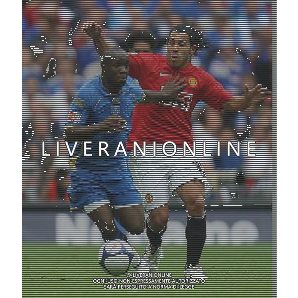 Manchester United v Portsmouth, FA Community Shield. Wembley Stadium. London. UK. 10/8/08 NELLA FOTO Lassana Diarra of Portsmouth and Carlos TŽvez FOTO IPS-AG ALDO LIVERANI ONLY ITALY 