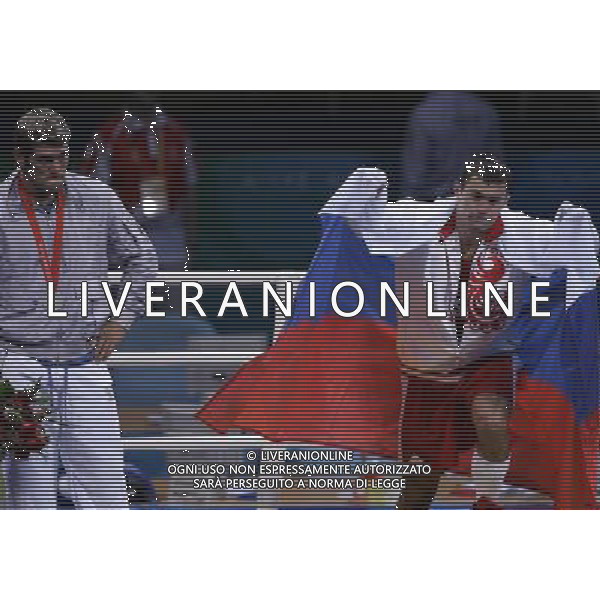 Pechino 23-08-2008 Giochi Olimpici Pechino Beijing 2008 boxe finale nella foto clemente russo (ITA) argento deluso sul podio e rakhim chakhkiev (Rus) oro ph marco luzzani/ag aldo liverani s.a.s.