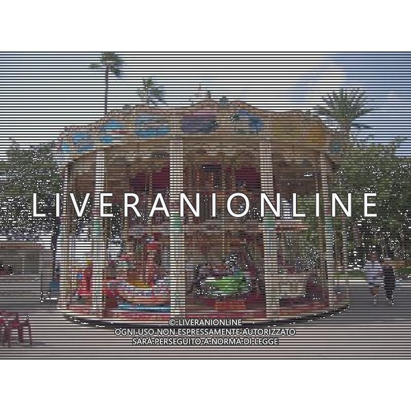 31 August 2008 - Cannes, France - Carousel. Since 1946 this palm fringed seafront featuring luxury boutiques and hotels is the home to the Cannes Film Festival. Photo Credit: Laura Farr/AdMedia - AG. ALDO LIVERANI SAS ITALY ONLY