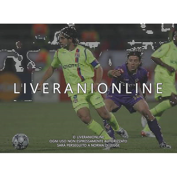 Lione (FRA) 18-09-2008 Champions League 2008/09 olympique Lyonnaise-fiorentina 2:2 nella foto juninho e riccardo montolivo ph marco luzzani/ag aldo liverani s.a.s.