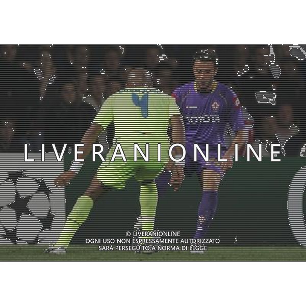 Lione (FRA) 18-09-2008 Champions League 2008/09 olympique Lyonnaise-fiorentina 2:2 nella foto giampaolo pazzini e jean-alain boumsong ph marco luzzani/ag aldo liverani s.a.s.