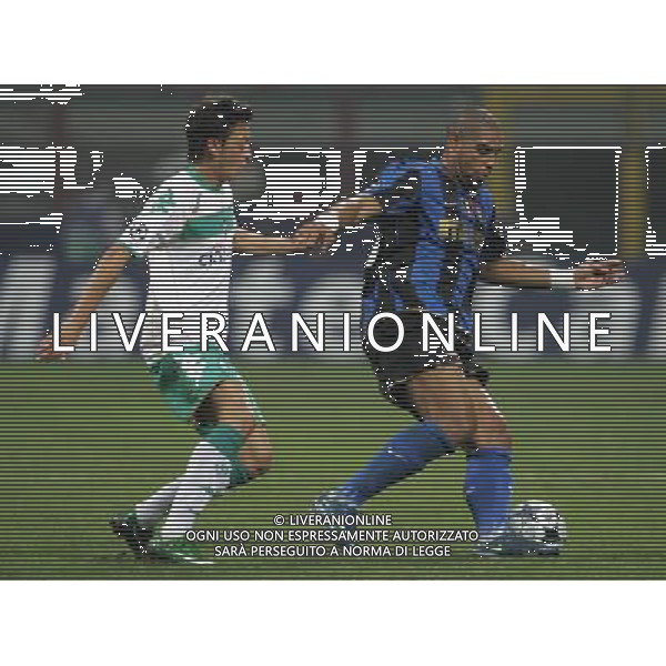 Milano 01-10-2009 champions league 2008/09 inter-werder brema 1:1 nella foto adriano e mesut ozil ph marco luzzani/ag aldo liverani s.a.s.