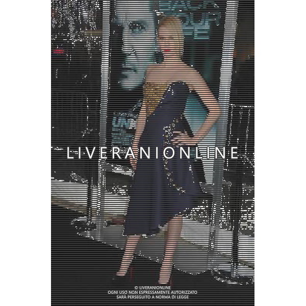 16 February 2011 - Westwood, California - January Jones. \'Unknown\' Los Angeles Premiere held at the Regency Village Theater. Photo Credit: Byron Purvis/AdMedia AG. ALDO LIVERANI SAS ITALY ONLY *** Local Caption *** .