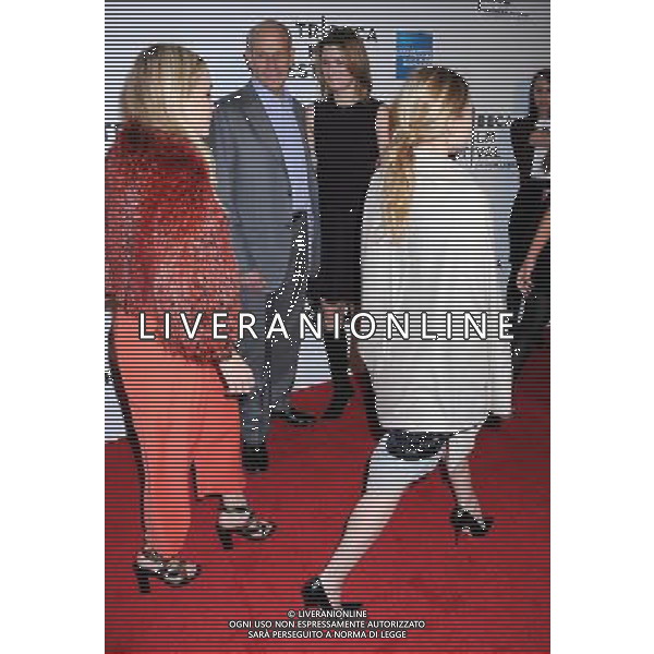 Mary-Kate and Ashley Olsen and Jonathan Tisch and wife Lizzie attending The opening night of The Tribeca Film Festival Screening of \' The Union\' on April 20, 2011 at The Winter Garden at the World Financial Plaza in New York City. AG. ALDO LIVERANI SAS ITALY ONLY *** Local Caption *** .