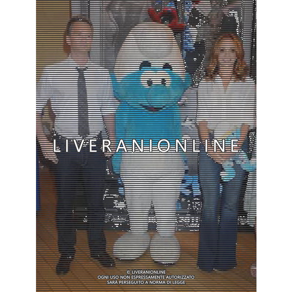 Neil Patrick Harris, Jayma Mays and Veronique Culliford visit the Build-A-Bear Workshop on July 27, 2011 in New York City.