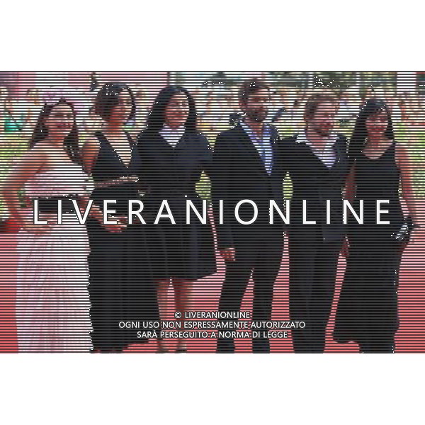 (110904) -- VENICE, Sept. 4, 2011 () -- Director Marjane Satrapi (3rd L), Vincent Paronnaud (3rd R) together with the cast pose on the red carpet for the premiere of the film \'Poulet Aux Prunes\' at the 68th Venice International Film Festival in Venice, Italy, late Sept. 3, 2011. (/Huang Xiaozhe) (srb) ITALY ONLY - Venezia 68ma Biennale di Venezia , Festival del Cinema 2011©PHOTOSHOT/ALDO LIVERANI ONLY ITALY *** Local Caption *** .