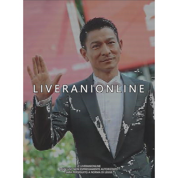 (110906) -- VENICE, Sept. 6, 2011 () -- Actor Andy Lau poses on the red carpet for the premiere of the Chinese Hong Kong film \'Taojie (A Simple Life)\' at the 68th Venice International Film Festival in Venice, Italy, Sept. 5, 2011. (/Wang Qingqin) (djj)