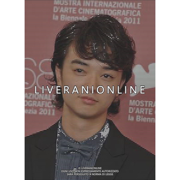 VENICE, Sept. 6, 2011 Japanese actor Shota Sometani poses during the photo call for the film \'Himizu\' at the 68th Venice International Film Festival in Venice, Italy, Sept. 6, 2011. (/Wang Qingqin) (djj)