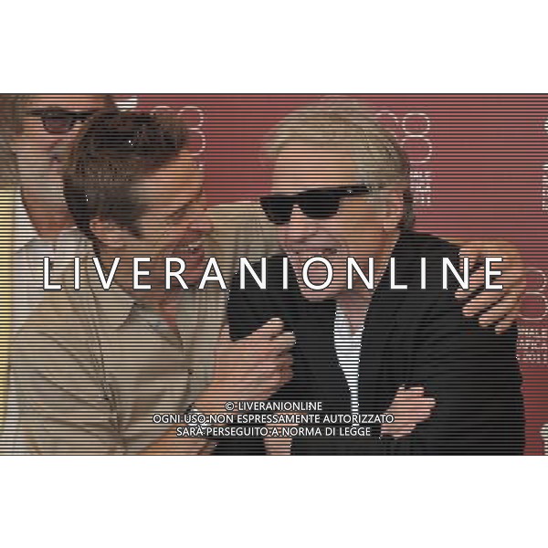 (110907) -- VENICE, Sept. 7, 2011 () -- U.S. director Abel Ferrara (R) and actor Willem Dafoe laugh during the photo-call for the film \'4:44 Last Day On Earth\' at the 68th Venice International Film Festival in Venice, Italy, Sept. 7, 2011. (/Wang Qingqin)