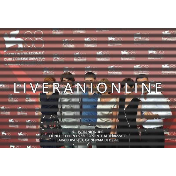 (110907) -- VENICE, Sept. 7, 2011 () -- Italian director Cristina Comencini (3rd R) and cast members pose during the photo-call for the film \'Quando La Notte\' at the 68th Venice International Film Festival in Venice, Italy, Sept. 7, 2011. (/Wang Qingqin) (zcc)