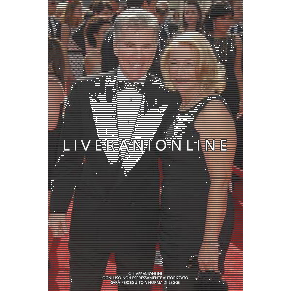 John Walsh and wife 2011 Primetime Creative Arts Emmy Awards at the Nokia Theatre L.A. Live September 10, 2011 - Los Angeles, California