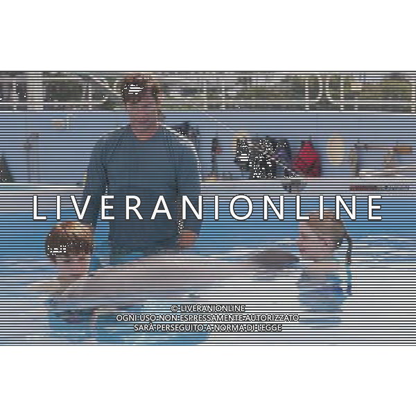 L-r: NATHAN GAMBLE as Sawyer Nelson, HARRY CONNICK, JR. as Dr. Clay Haskett and COZI ZUEHLSDORFF as Hazel Haskett with WINTER in Alcon Entertainment\'s family adventure Dolphin Tale a Warner Bros. Pictures release. © LFI - PHOTOSHOT - AG. ALDO LIVERANI SAS ITALY ONLY